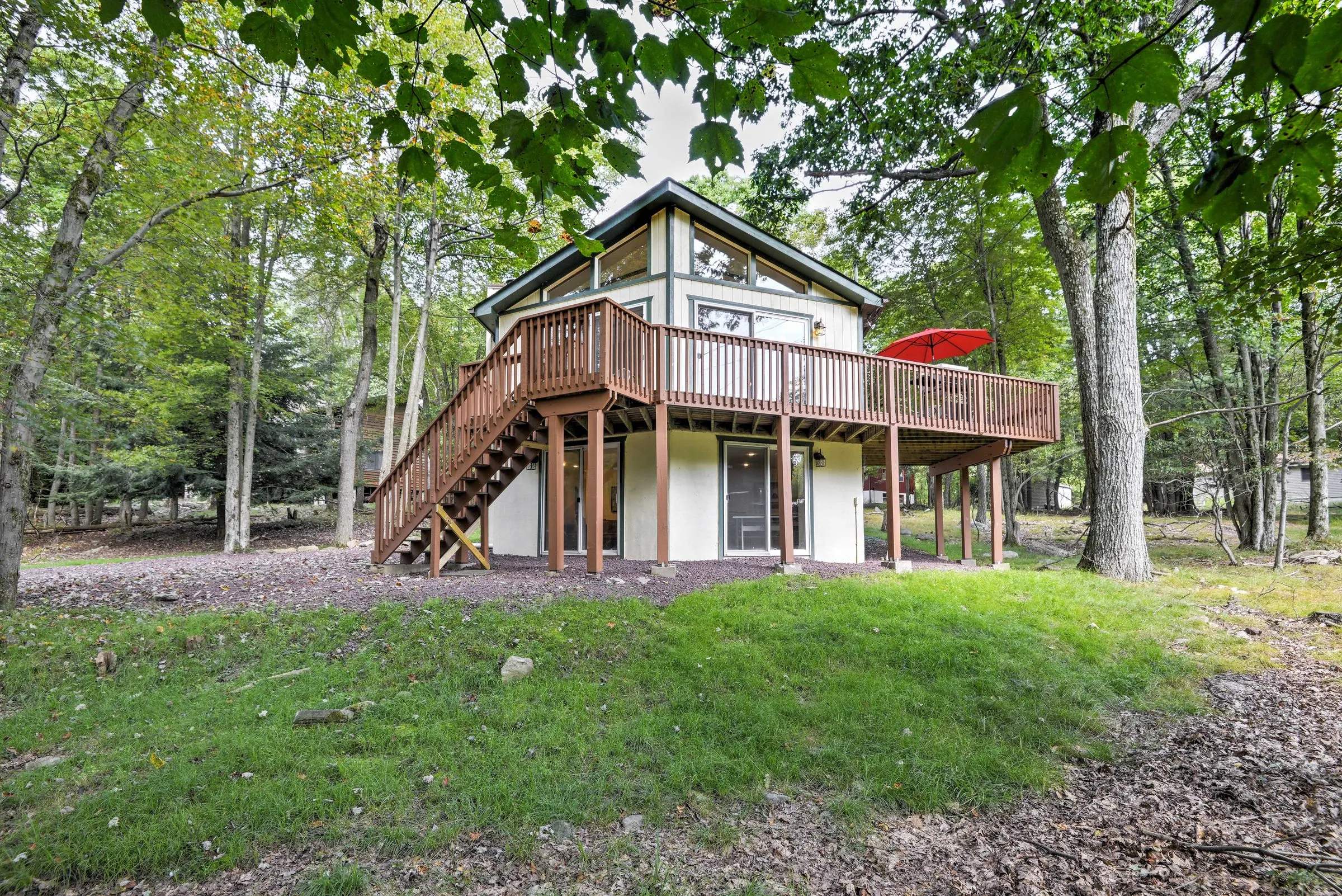 148 Pineknoll, a home Ideal manages in Lake Harmony, with a propane fire pit and seating area