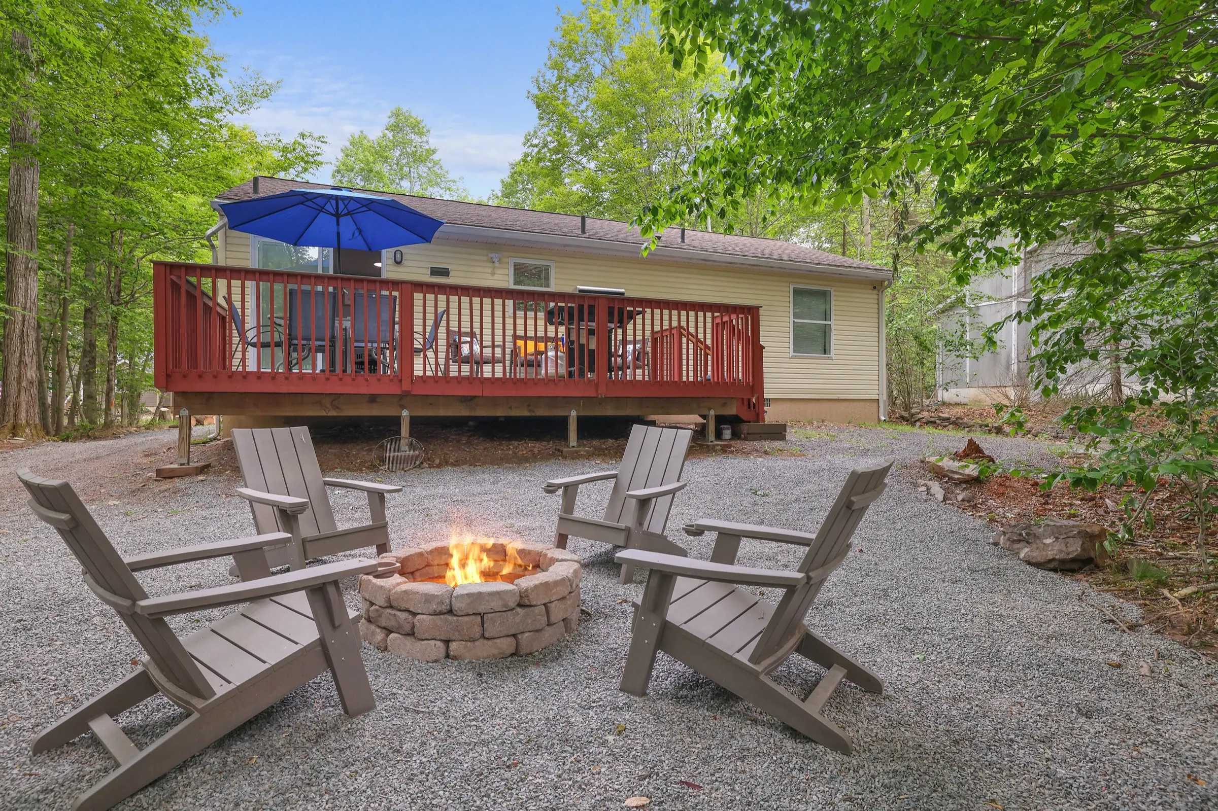 The deck and fire pit of a home Ideal manages